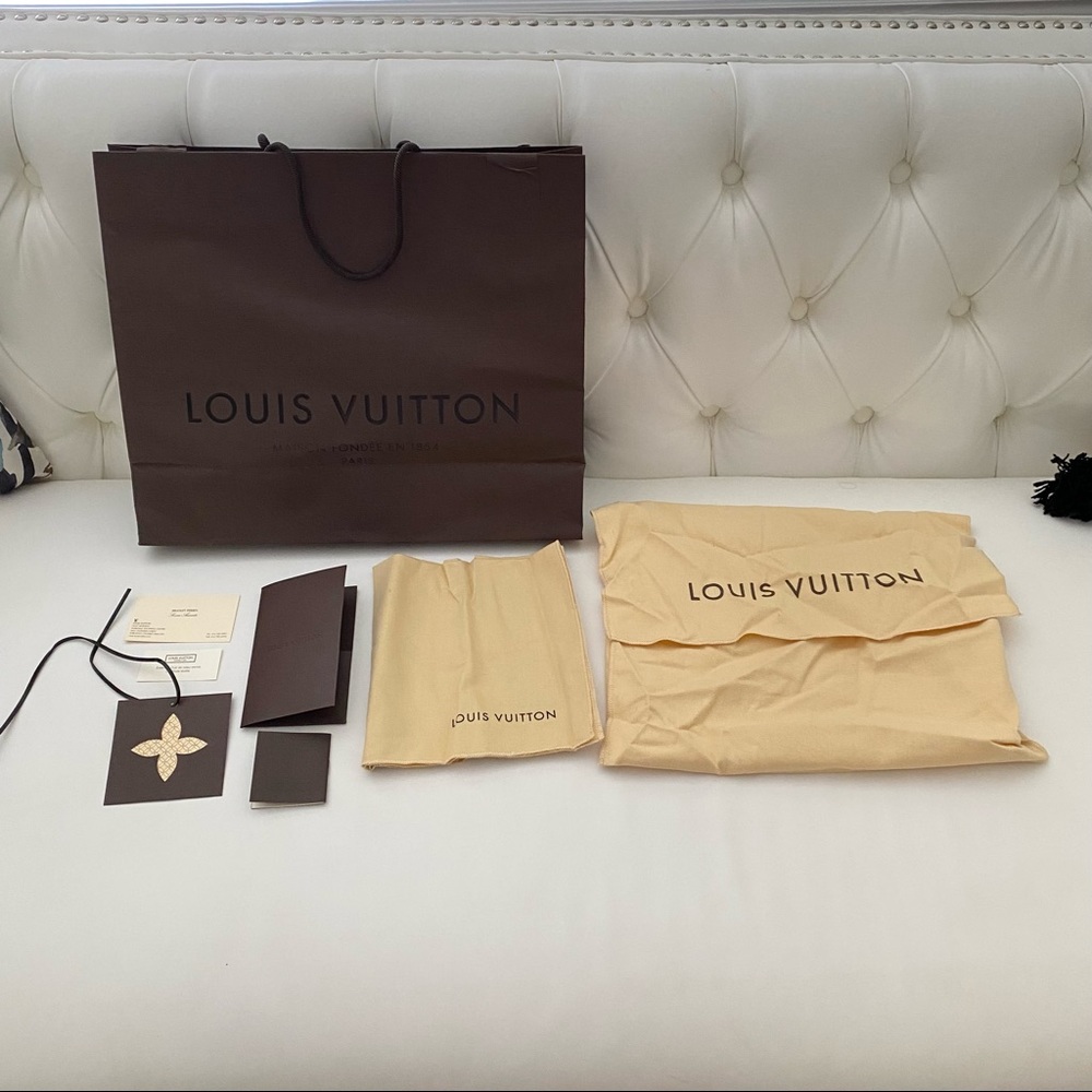 Louis Vuitton shopping bag and dust bag